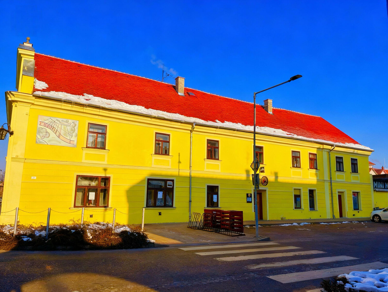 Tuson Apartment building exterior with red roof